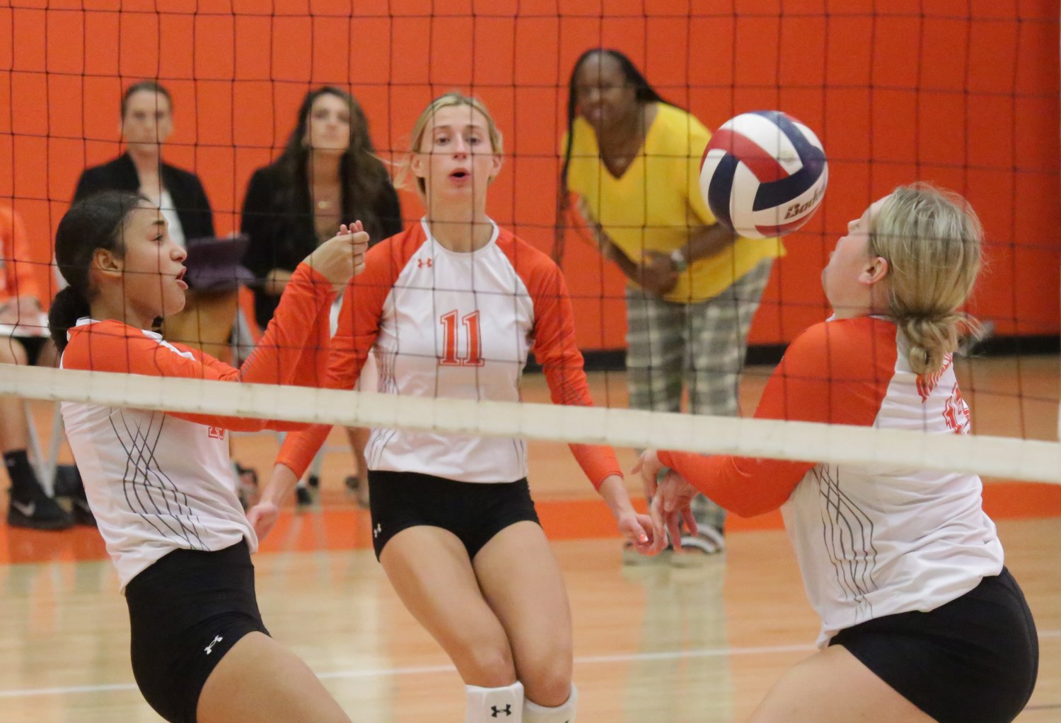 Every single point was crucial in Mineola’s four-set win over Mt. Vernon last Friday. Here Kyra Jackson, Olivia Hughes, and Jocelyn Whitehead (l-r) react to the action.